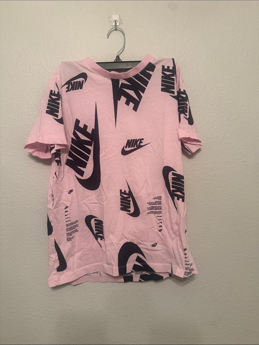 Nike Kids Pink Tee with Black Allover Logo
